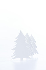 Obraz premium white paper christmas trees, isolated on white