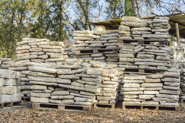 Square stack of stone slabs