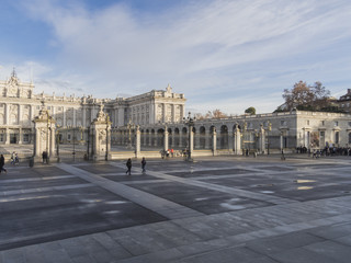 Tourists at The entrance of the Royal palace. Madrid, Spain.