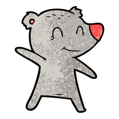 smiling bear pointing