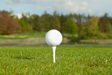 Golf ball on the tee, golf course of Adare in Ireland