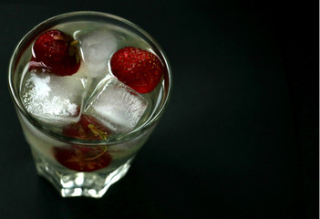 cocktail in the glass with ice cubes