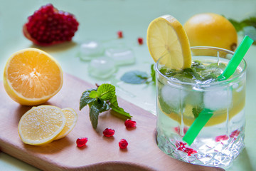 Refreshing drink with lemon and ice