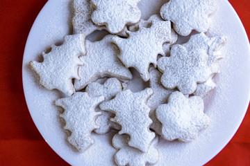 Homemade Christmas cakes sprinkled with sugar