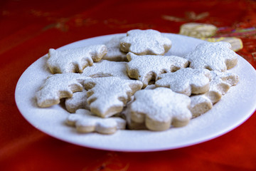 Homemade Christmas cakes sprinkled with sugar