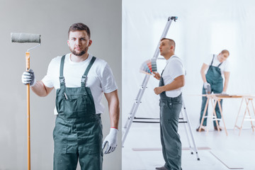 Painter holding roller