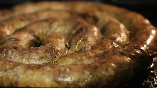 Close-up shot: Fried sausage. Unhealthy food