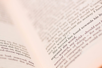 Close up of open book with words