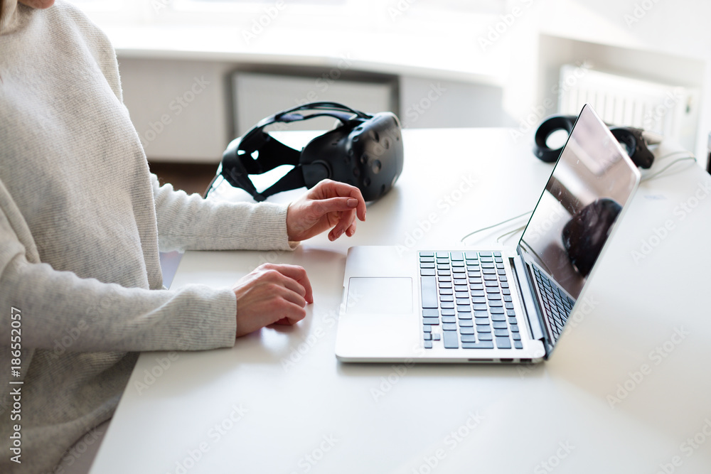 Wall mural woman working at the laptop