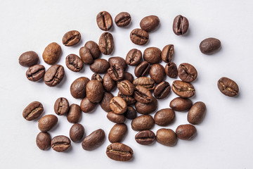 Background from organic random spilled coffee arabica in beans