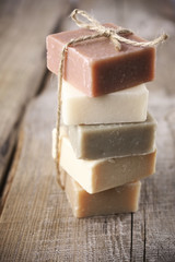 Assorted natural soap bars on wood - 186556259