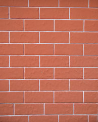 New decorative red plaster imitating cladding slabs