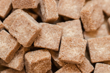 Brown sugar background. Close up