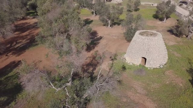 Trullo aerial view. A stone field hut in the shape of a trullo in the Pulia region of Italy