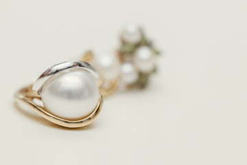 Earrings with Pearl on white background