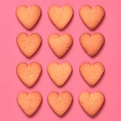 Cookies Hearts background. Valentines Day. Love set. Vanilla Pastel Color. Trendy fashion Style. Layout. Homemade Cookies on Pink, biscuit Dessert. Minimal. Art