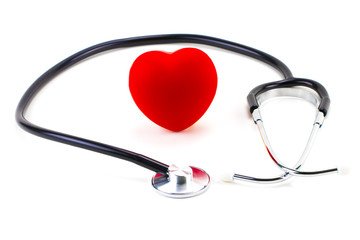 Stethoscope around a red rubber heart on a white background; concept of health, healthy heart, or...