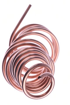 Spiral copper wire isolated on white background