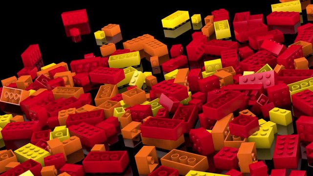 Red, orange and yellow plastic bricks tumble into a pile (C4D Modeled/Rendered)