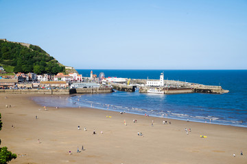 Scarborough, Yorkshire, England, UK; The South Sands and Harbour.