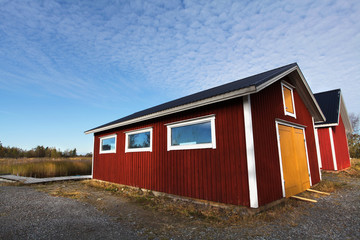 Fototapeta na wymiar Red boathouse in Finland
