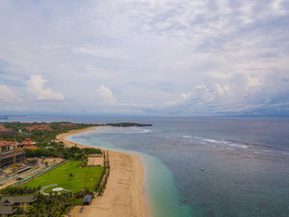Aerial view of Nusa Dua beach from drone, Bali island, Indonesia