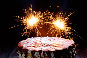 Chocolate and cream Cake with Bengal lights