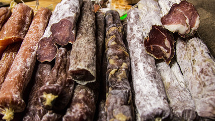 On the counter is a sausage made from natural meat
