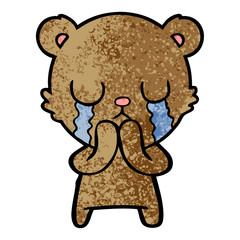 crying cartoon bear