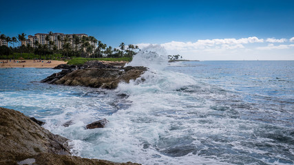 Waves Crashing against rocks on the Hawaiian coastline