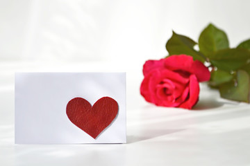 Fototapeta na wymiar Valentine card and rose. Love concept