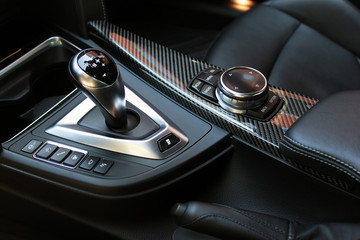 Car interior. Gear shift. Black. Inside car detail.