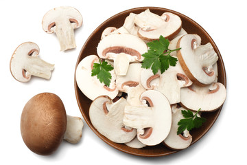 Fresh champignon mushrooms isolated on white background. top view