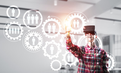 Guy wearing checked shirt and virtual mask demonstrating some emotions