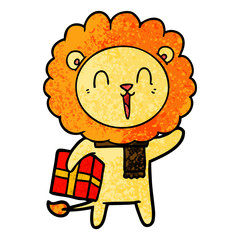 laughing lion cartoon with christmas present