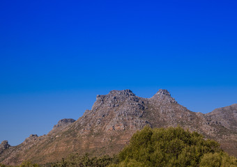 Fototapeta na wymiar Landscape of Cape Town with seldom view of the Table Mountain without clouds in South Africa