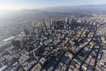 Aerial view of urban downtown streets and buildings in Los Angeles, California.