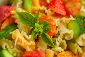  delicious gigli t with shrimps and basil on  wooden background