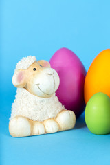 Easter lamb with the pain of a ladybug on the ear