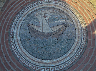 Fototapeta na wymiar Mosaic of boat and see on floor