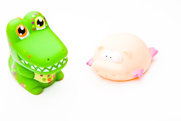 Baby Rubber crocodile and pig toy studio quality white background