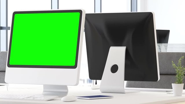Desktop Computer with track green screen on a desktop