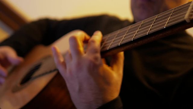 4k Guitarist plays jazz by classic acoustic guitar at the record studio