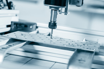 Milling machine working on steel detail.