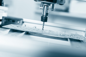 Milling machine working on steel detail.