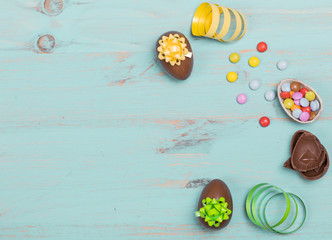 Easter composition on color wooden background