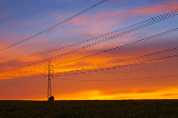 Silhouette of high voltage electrical pole structure