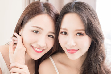two beauty woman in home