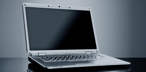 Modern laptop isolated on black background