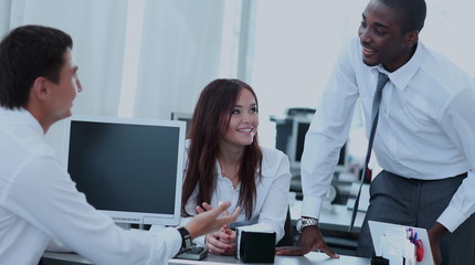 Coworkers working in sunny office. Successful business team